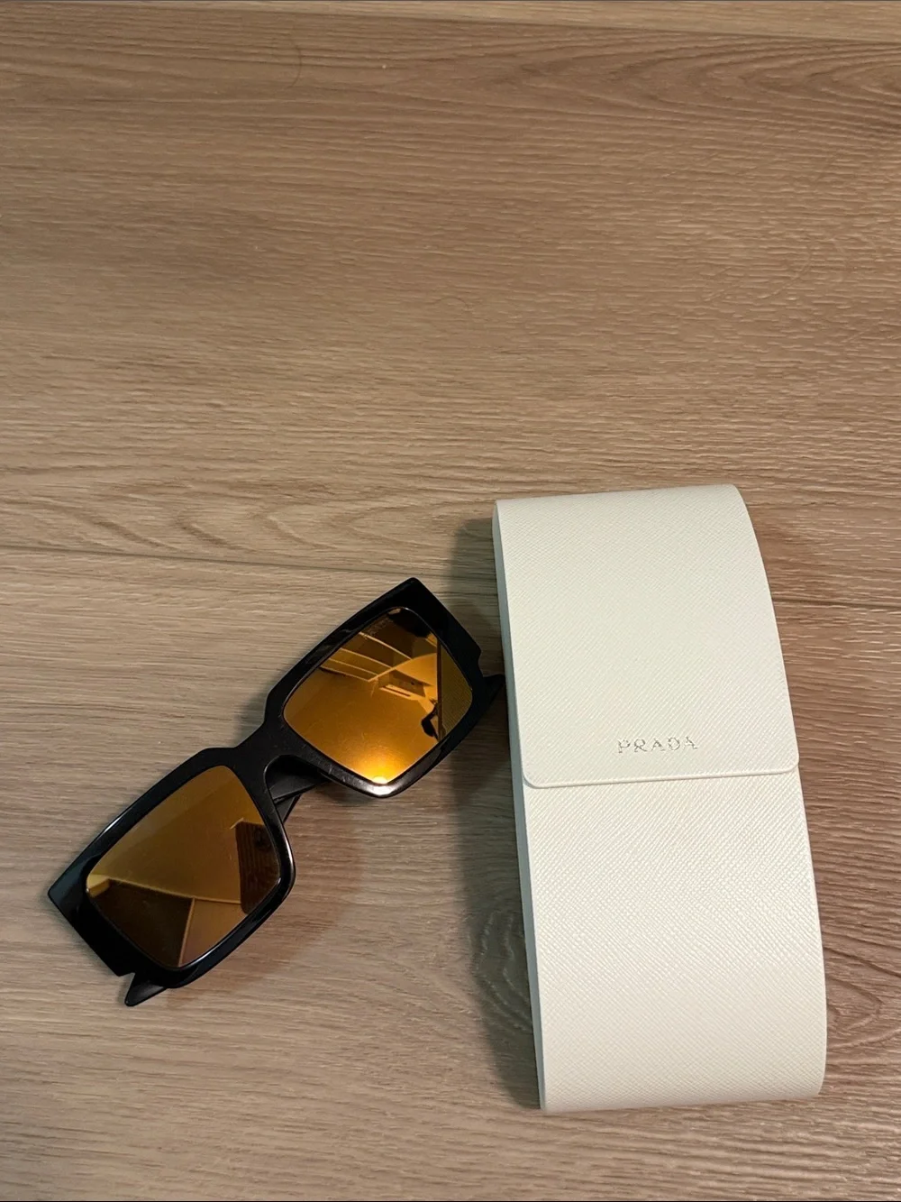 Prada Black and Gold Geometric Logo Sunglasses